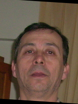 Person who looks like Greg Kinnear