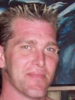 Person who looks like Mickey Rourke