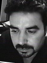 Person who looks like Tim Curry