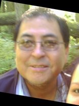 Person who looks like John Lennon