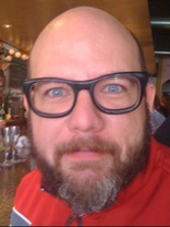 Person who looks like Drew Carey