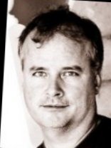 Person who looks like Greg Kinnear