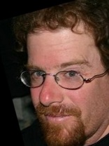 Person who looks like Elvis Costello