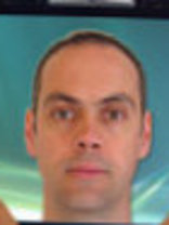 Person who looks like Tim Curry