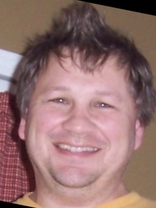 Person who looks like Drew Carey