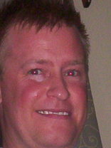 Person who looks like Tim Robbins