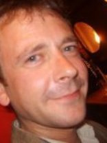 Person who looks like Greg Kinnear