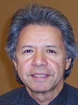 Person who looks like Carlos Santana