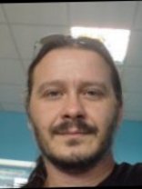 Person who looks like Carlos Santana