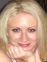 Person who looks like Oksana Baiul