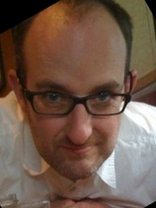 Person who looks like Elvis Costello