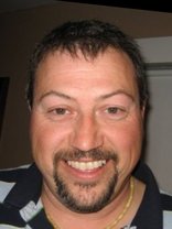 Person who looks like Tim Curry