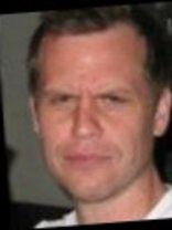 Person who looks like Greg Kinnear