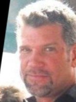 Person who looks like Chris Isaak