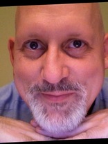 Person who looks like Stanley Tucci