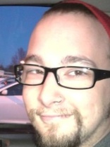 Person who looks like Elvis Costello