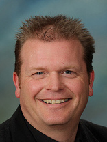 Person who looks like Drew Carey