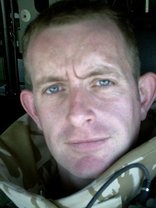 Person who looks like Greg Kinnear