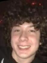 Person who looks like Rob Schneider