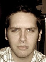 Person who looks like Greg Kinnear