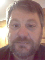 Person who looks like Tim Curry