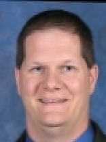 Person who looks like Drew Carey