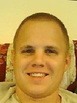 Person who looks like Drew Carey