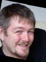 Person who looks like Tim Curry