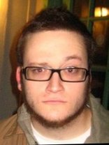 Person who looks like Elvis Costello