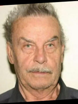 Person who looks like Tim Curry