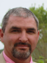 Person who looks like Burt Reynolds