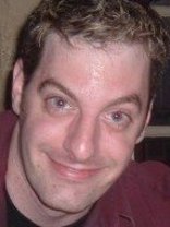 Person who looks like Tim Curry