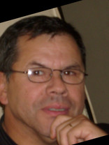 Person who looks like Greg Kinnear