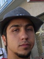 Person who looks like Jason Schwartzman