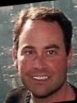 Person who looks like Greg Kinnear