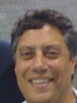 Person who looks like Tim Curry