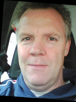 Person who looks like Tim Robbins