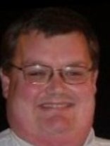 Person who looks like Drew Carey