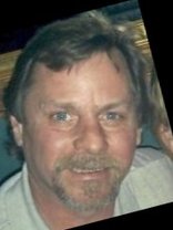 Person who looks like Greg Kinnear