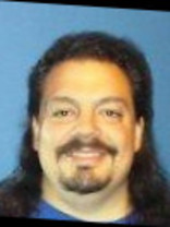 Person who looks like Tim Curry