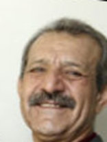 Person who looks like Carlos Santana