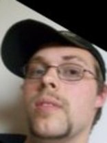 Person who looks like Tim Curry