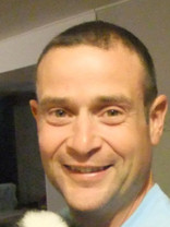 Person who looks like Tim Robbins