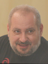 Person who looks like Tim Curry