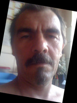 Person who looks like Carlos Santana