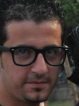 Person who looks like Elvis Costello