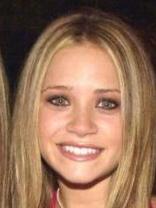 Person who looks like Mary-Kate and Ashley Olsen