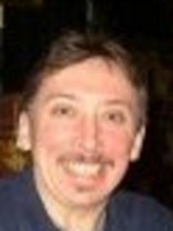 Person who looks like Tim Curry