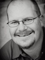 Person who looks like Drew Carey