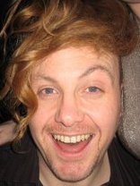 Person who looks like Tim Curry